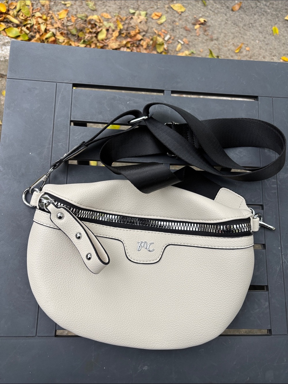 Cream Crossbody Belt Bag with Black Strap and Silver Trim